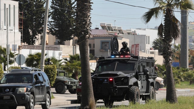Security forces operate near a crime scene where a U.S. citizen shot and killed a state Mexican police officer, in Tijuana 