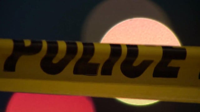 Police tape at a crime scene. 