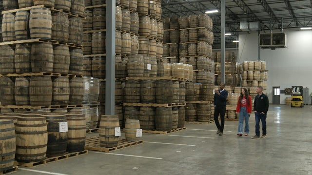 Bill Whitaker with Jess and Ben Loseke of Midwest Barrels