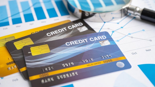 Credit card on chart and graph paper. Finance development, Banking Account, Statistics, Investment Analytic research data economy, Stock exchange trading, Business company concept. 